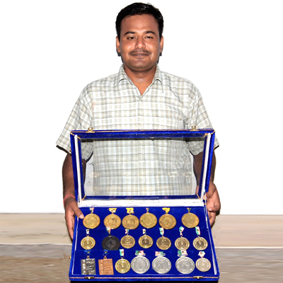 Blind student Anand Chowdhary with various winning Medals